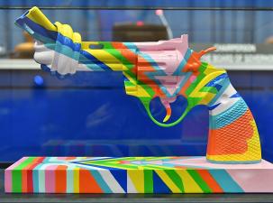 The Non-Violence Sculpture ‘The Knotted Gun’, donated by the Permanent Mission of Sweden on the occasion of the Swedish Chairmanship of the IAEA Board of Governors 2019-2020. The Knotted Gun is a vision of World Peace. The original displayed at the United Nations’ Headquarters in New York. Created by the Swedish artist Carl Fredrik Reuterswärd; colour pattern by Paul McCartney. IAEA Vienna, Austria. 28 September 2020